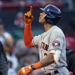 
              Houston Astros' Jeremy Pena points upward while crossing the plate on a solo home run during the second inning of a baseball game against the Boston Red Sox at Fenway Park, Tuesday, May 17, 2022, in Boston. (AP Photo/Charles Krupa)
            