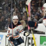 
              Edmonton Oilers left wing Zach Hyman, left, celebrates his power play goal with center Connor McDavid during the first period in Game 3 of an NHL hockey Stanley Cup first-round playoff series against the Los Angeles Kings Friday, May 6, 2022, in Los Angeles. (AP Photo/Mark J. Terrill)
            