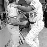 
              FILE - Joe Pignatano, right, a bullpen coach for the New York Mets, talks with Cincinnati Reds star Pete Rose in New York, July 27, 1978, before a baseball game. Pignatano, who made his major league debut with the Brooklyn Dodgers in 1957 and later was a coach for the Mets, died Monday, May 23, 2022, in Naples, Fla. (AP Photo/G. Paul Burnett, File)
            