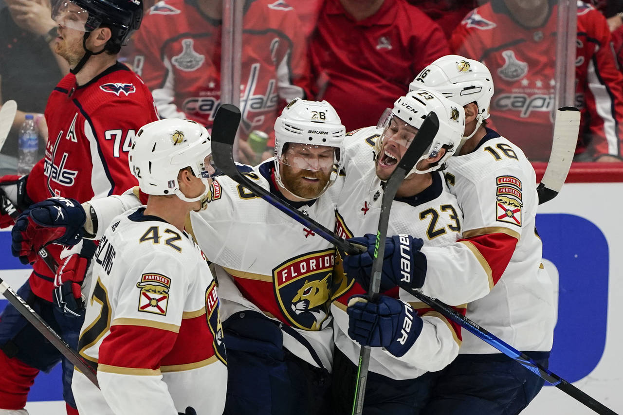 Florida Panthers defenseman Gustav Forsling, right wing Claude Giroux, center Carter Verhaeghe and ...
