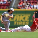 
              Cincinnati Reds' Albert Almora Jr., right, steals second base ahead of the tag from Pittsburgh Pirates' Cole Tucker during the fifth inning of a baseball game against of a doubleheader in Cincinnati, Sunday, May 8, 2022. (AP Photo/Aaron Doster)
            