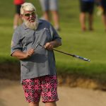 
              John Daly putts on the fourth hole during a practice round for the PGA Championship golf tournament, Wednesday, May 18, 2022, in Tulsa, Okla. (AP Photo/Matt York)
            