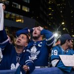 
              Fans react during Game 7 of an NHL hockey first-round playoff series between the Toronto Maple Leafs and the Tampa Bay Lightning in Toronto, Saturday May 14, 2022. (Christopher Katsarov/The Canadian Press via AP)
            