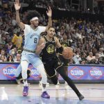 
              Memphis Grizzlies' Ziaire Williams (8) defends Golden State Warriors' Jordan Poole (3) in the first half of Game 5 of an NBA basketball second-round playoff series Wednesday, May 11, 2022, in Memphis, Tenn. (AP Photo/Karen Pulfer Focht)
            
