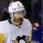 
              Pittsburgh Penguins defenseman Mike Matheson reacts after being called for a penalty during the second period in Game 7 of an NHL hockey Stanley Cup first-round playoff series against the New York Rangers, Sunday, May 15, 2022, in New York. (AP Photo/Adam Hunger)
            