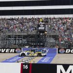 
              Chase Elliott (9) crosses the finish line, winning the NASCAR Cup Series auto race at Dover Motor Speedway, Monday, May 2, 2022, in Dover, Del. (AP Photo/Jason Minto)
            