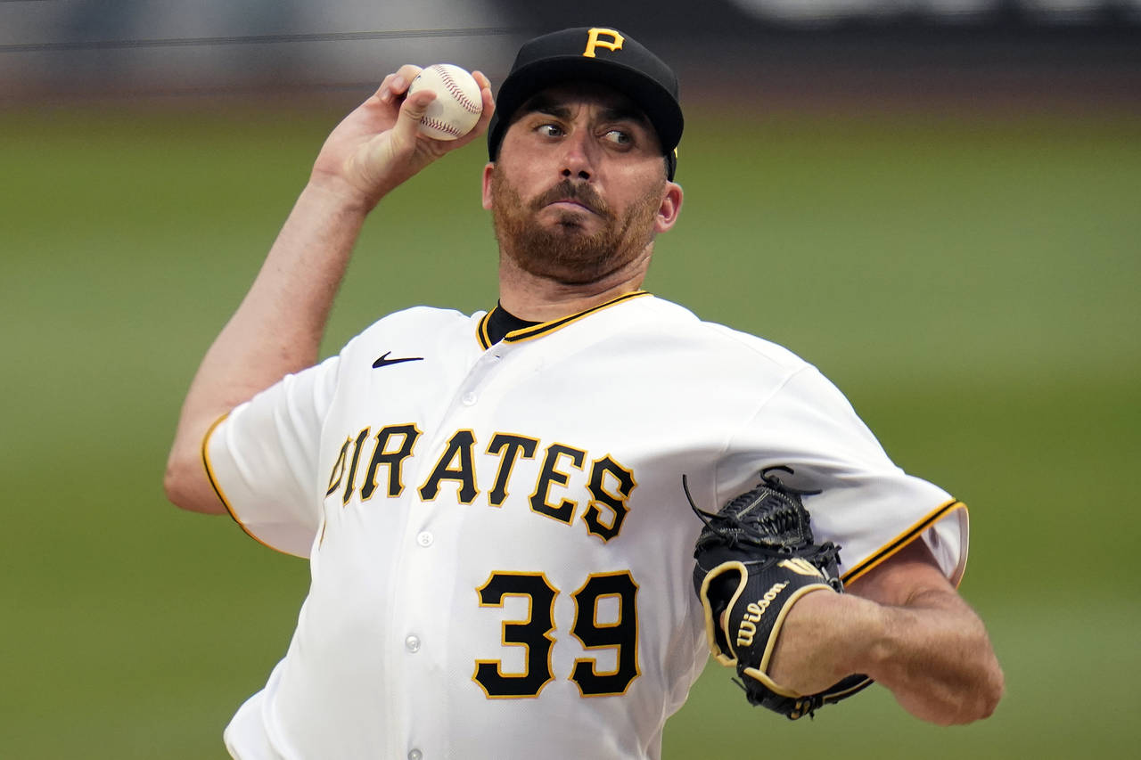 Pittsburgh Pirates starting pitcher Zach Thompson delivers during the first inning of the team's ba...