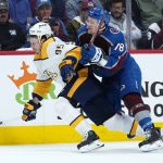 
              Colorado Avalanche center Nico Sturm (78) pushes Nashville Predators center Matt Duchene (95) during the second period in Game 1 of an NHL hockey Stanley Cup first-round playoff series Tuesday, May 3, 2022, in Denver. (AP Photo/Jack Dempsey)
            