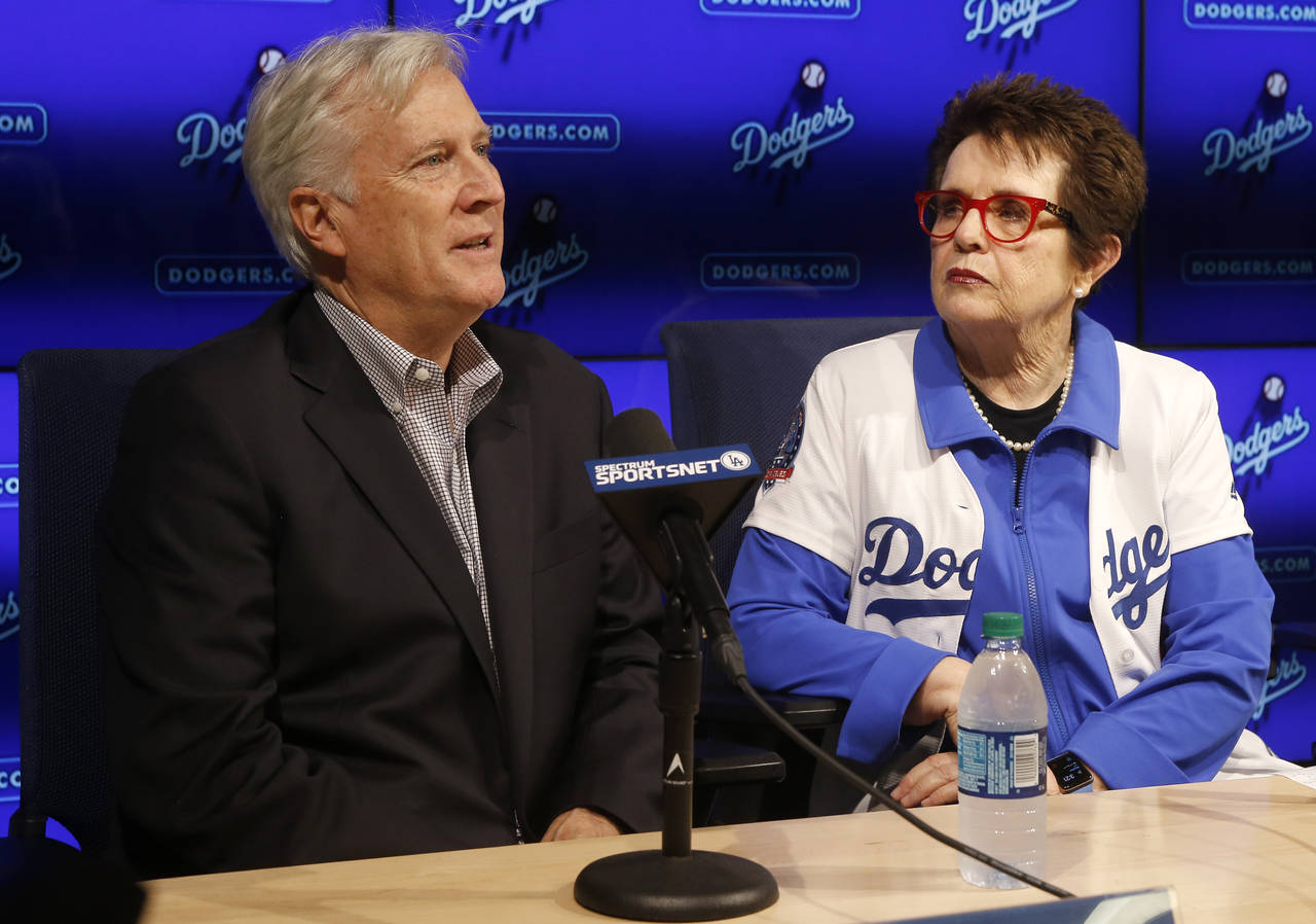 FILE -Los Angeles Dodgers owner & chairman Mark Walter, left, introduces to the baseball team owner...
