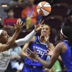 
              Connecticut Sun forward DeWanna Bonner (24) and forward Jonquel Jones, right, compete against Dallas Wings forward Kayla Thornton (6) for a rebound during a WNBA basketball game Tuesday, May 24, 2022, in Uncasville, Conn. (Sean D. Elliot/The Day via AP)
            