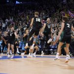 
              Hawaii players celebrate after defeating Long Beach State to win the NCAA men's college volleyball championship Saturday, May 7, 2022, in Los Angeles. (AP Photo/Marcio Jose Sanchez)
            
