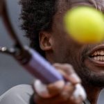 
              Gael Monfils, of France, returns the ball against Serbia's Novak Djokovic during their match at the Mutua Madrid Open tennis tournament in Madrid, Spain, Tuesday, May 3, 2022. (AP Photo/Manu Fernandez)
            