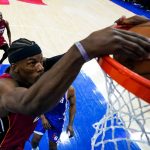 
              Miami Heat's Jimmy Butler dunks against the Philadelphia 76ers during the second half of Game 6 of an NBA basketball second-round playoff series, Thursday, May 12, 2022, in Philadelphia. (AP Photo/Matt Slocum)
            