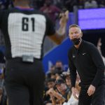 
              Golden State Warriors coach Steve Kerr, right, reacts to referee Courtney Kirkland (61) after a call during the first half of Game 3 of the team's NBA basketball Western Conference playoff semifinal against the Memphis Grizzlies in San Francisco, Saturday, May 7, 2022. (AP Photo/Jeff Chiu)
            