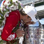 
              Marcus Ericsson, of Sweden, kisses the Borg-Warner Trophy during the traditional winners photo session at Indianapolis Motor Speedway in Indianapolis, Monday, May 30, 2022. Ericsson won the 106th running of the Indianapolis 500 auto race Sunday. (AP Photo/Michael Conroy)
            