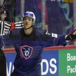 
              Jordan Perret of France celebrates after he scored his side's second goal during the group A Hockey World Championship match between France and Slovakia in Helsinki, Finland, Friday May 13, 2022. (AP Photo/Martin Meissner)
            