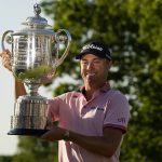 
              Justin Thomas holds the Wanamaker Trophy after winning the PGA Championship golf tournament in s playoff against Will Zalatoris at Southern Hills Country Club, Sunday, May 22, 2022, in Tulsa, Okla. (AP Photo/Eric Gay)
            