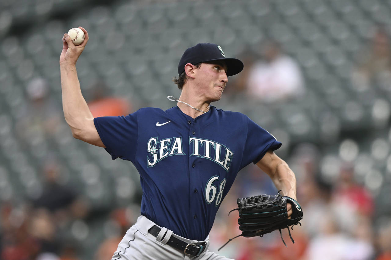 Seattle Mariners pitcher George Kirby throws against the Baltimore Orioles in the first inning of a...