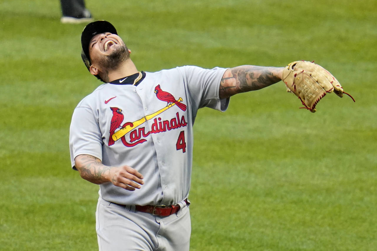 St. Louis Cardinals relief pitcher Yadier Molina reacts to giving up a two-run home run to Pittsbur...