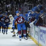 
              Colorado Avalanche center Nathan McKinnon (29) celebrates a goal against the Nashville Predators during the first period in Game 2 of an NHL hockey Stanley Cup first-round playoff series Thursday, May 5, 2022, in Denver. (AP Photo/Jack Dempsey)
            
