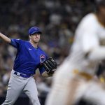 
              Chicago Cubs starting pitcher Kyle Hendricks throws to first for an out against San Diego Padres' Jose Azocar during the sixth inning of a baseball game Monday, May 9, 2022, in San Diego. (AP Photo/Gregory Bull)
            