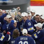 
              Team Finland celebrates after the Hockey World Championship final match between Finland and Canada, Sunday May 29, 2022, in Tampere, Finland. Finland won 4-3 in overtime. (AP Photo/Martin Meissner)
            