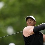 
              Tiger Woods watches his tee shot on the 17th hole during the third round of the PGA Championship golf tournament at Southern Hills Country Club, Saturday, May 21, 2022, in Tulsa, Okla. (AP Photo/Eric Gay)
            