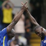 
              Chelsea's Romelu Lukaku, left, celebrates with his teammate Antonio Rudiger after scoring his side's opening goal during the English Premier League soccer match between Chelsea and Wolverhampton at Stamford Bridge stadium, in London, Saturday, May 7, 2022. (AP Photo/Frank Augstein)
            