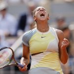 
              Madison Keys of the U.S. celebrates winning her second round match against France's Caroline Garcia in two sets, 6-4, 7-6 (7-3), at the French Open tennis tournament in Roland Garros stadium in Paris, France, Thursday, May 26, 2022. (AP Photo/Jean-Francois Badias)
            