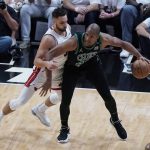 
              Miami Heat guard Max Strus (31) defends Boston Celtics center Al Horford (42) during the first half of Game 5 of the NBA basketball Eastern Conference finals playoff series, Wednesday, May 25, 2022, in Miami. (AP Photo/Wilfredo Lee)
            