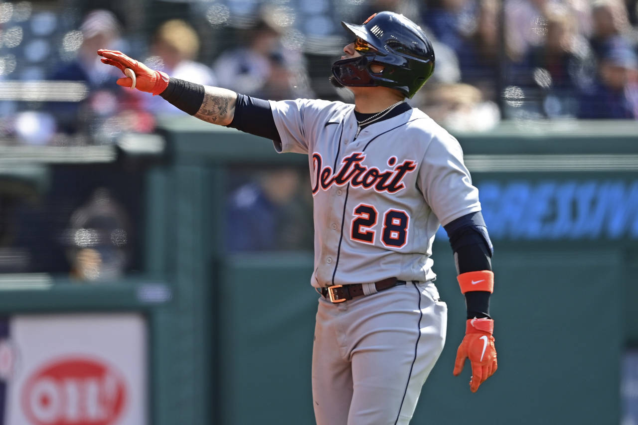 Detroit Tigers' Javier Baez celebrates after hitting a solo home run off Cleveland Guardians relief...