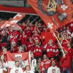 
              Swiss supporters celebrate during the group A Hockey World Championship match between Switzerland and Italy in Helsinki, Finland, Saturday May 14, 2022. (AP Photo/Martin Meissner)
            