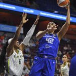 
              Connecticut Sun center Brionna Jones (42) shoots over Dallas Wings forward Kayla Thornton (6) during a WNBA basketball game Tuesday, May 24, 2022, in Uncasville, Conn. (Sean D. Elliot/The Day via AP)
            