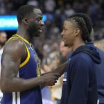 
              Golden State Warriors forward Draymond Green, left, talks with Memphis Grizzlies' Ja Morant after Game 6 of an NBA basketball Western Conference playoff semifinal in San Francisco, Friday, May 13, 2022. The Warriors won 110-96 and advanced to the conference finals. (AP Photo/Tony Avelar)
            