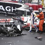 
              Haas driver Mick Schumacher of Germany leaves his car after crashing during the Monaco Formula One Grand Prix, at the Monaco racetrack, in Monaco, Sunday, May 29, 2022. (Pool Photo/Christian Bruna/Via AP)
            