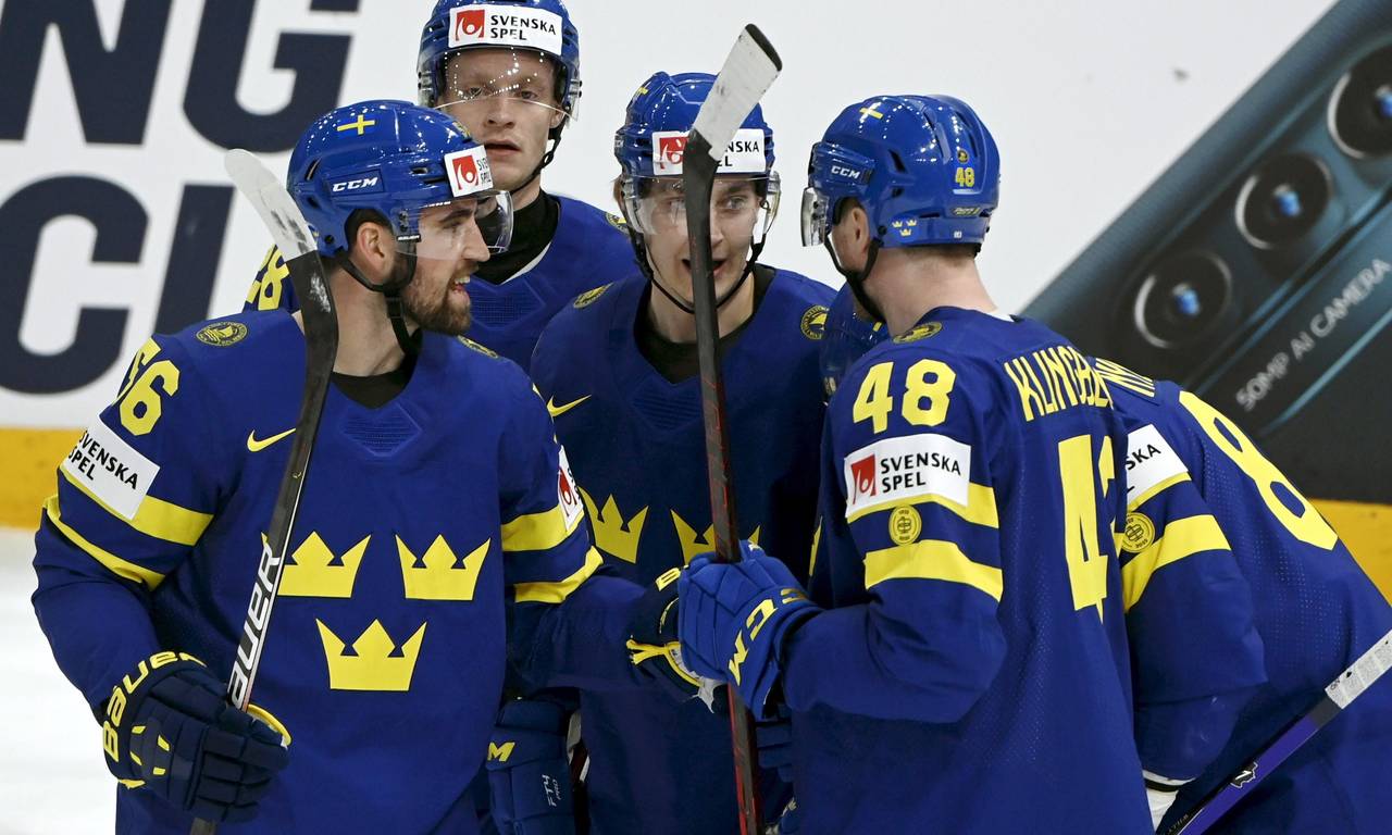 Sweden's players celebrate after scoring a goal during the 2022 IIHF Ice Hockey World Championships...