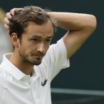 
              FILE - Russia's Daniil Medvedev reacts during the men's singles fourth round match against Poland's Hubert Hurkacz on day eight of the Wimbledon Tennis Championships in London, Tuesday, July 6, 2021. The ATP men’s professional tennis tour will not award ranking points for Wimbledon this year because of the All England Club’s ban on players from Russia and Belarus over the invasion of Ukraine. The ATP announced its decision Friday night, May 20, 2022, two days before the start of the French Open — and a little more than a month before play begins at Wimbledon on June 27. It is a highly unusual and significant rebuke of the oldest Grand Slam tournament. (AP Photo/Kirsty Wigglesworth, File)
            