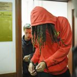 
              WNBA star and two-time Olympic gold medalist Brittney Griner leaves a courtroom after a hearing, in Khimki just outside Moscow, Russia, Friday, May 13, 2022. Griner, a two-time Olympic gold medalist, was detained at the Moscow airport in February after vape cartridges containing oil derived from cannabis were allegedly found in her luggage, which could carry a maximum penalty of 10 years in prison.  (AP Photo/Alexander Zemlianichenko)
            