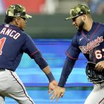 
              Minnesota Twins' Jorge Polanco (11) and Gilberto Celestino (67) celebrate after their baseball game against the Kansas City Royals Friday, May 20, 2022, in Kansas City, Mo. The Twins won 6-4.(AP Photo/Charlie Riedel)
            