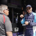 
              Marco Andretti talks with Mario Andretti during practice for the Indianapolis 500 auto race at Indianapolis Motor Speedway, Tuesday, May 17, 2022, in Indianapolis. (AP Photo/Darron Cummings)
            