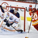 
              Edmonton Oilers goalie Mikko Koskinen, center, reacts as Calgary Flames forward Blake Coleman celebrates his goal during the second period of Game 1 of an NHL hockey second-round playoff series Wednesday, May 18, 2022, in Calgary, Alberta. (Jeff McIntosh/The Canadian Press via AP)
            