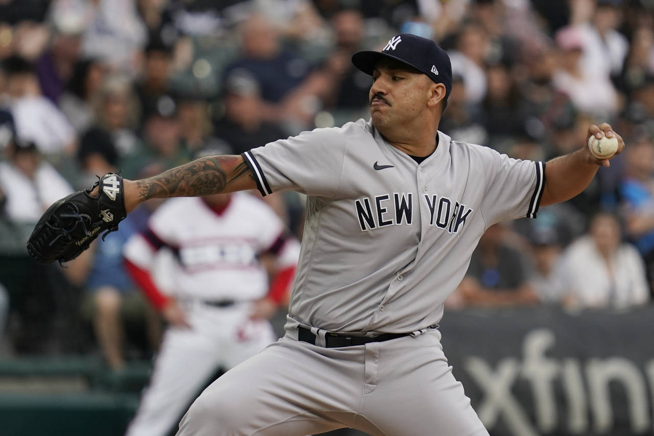 New York Yankees starting pitcher Nestor Cortes throws against the Chicago White Sox during the fir...