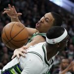 
              Boston Celtics' Grant Williams is fouled by Milwaukee Bucks' Bobby Portis during the second half of Game 3 of an NBA basketball Eastern Conference semifinals playoff series Saturday, May 7, 2022, in Milwaukee. The Bucks won 103-101 to take a 2-1 lead in the series. (AP Photo/Morry Gash)
            