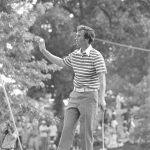 
              FILE - Hubert Green waves to spectators after holing out to win the U.S. Open Championship golf tournament at Southern Hills Country Club in Tulsa, Okla., on June 19, 1977. Green won despite police investigating a death threat against him in the final round.(AP Photo/File)
            
