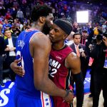 
              Miami Heat's Jimmy Butler, right, and Philadelphia 76ers' Joel Embiid embrace after Game 6 of an NBA basketball second-round playoff series, Thursday, May 12, 2022, in Philadelphia. (AP Photo/Matt Slocum)
            
