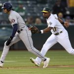 
              Houston Astros' Jeremy Pena, left, is caught in a rundown by Oakland Athletics' Elvis Andrus during the fifth inning of a baseball game in Oakland, Calif., Tuesday, May 31, 2022. (AP Photo/Jed Jacobsohn)
            