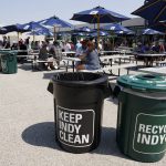 
              Recycle containers are placed in the eating area at the Indianapolis 500 auto race at Indianapolis Motor Speedway, Friday, May 20, 2022, in Indianapolis. (AP Photo/Darron Cummings)
            