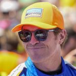 
              Scott Dixon, of New Zealand, walks to his car before the Indianapolis 500 auto race at Indianapolis Motor Speedway in Indianapolis, Sunday, May 29, 2022. (AP Photo/AJ Mast)
            