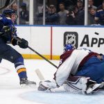 
              St. Louis Blues' Vladimir Tarasenko, left, shoot wide of Colorado Avalanche goaltender Darcy Kuemper during the second period in Game 4 of an NHL hockey Stanley Cup second-round playoff series Monday, May 23, 2022, in St. Louis. (AP Photo/Jeff Roberson)
            