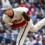 
              Philadelphia Phillies starting pitcher Kyle Gibson (44) throws during the first inning of the first game of a double header against the New York Mets, Sunday, May 8, 2022, in Philadelphia. (AP Photo/Laurence Kesterson)
            